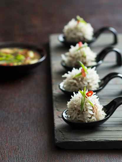 Steamed rice balls with spicy lime dipping sauce