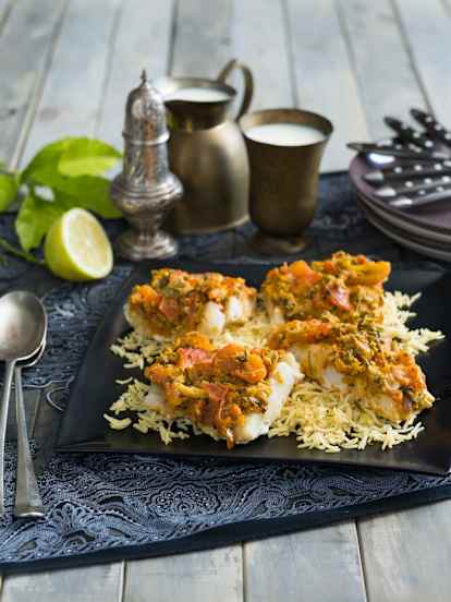 Steamed white fish with tomato and Indian spices