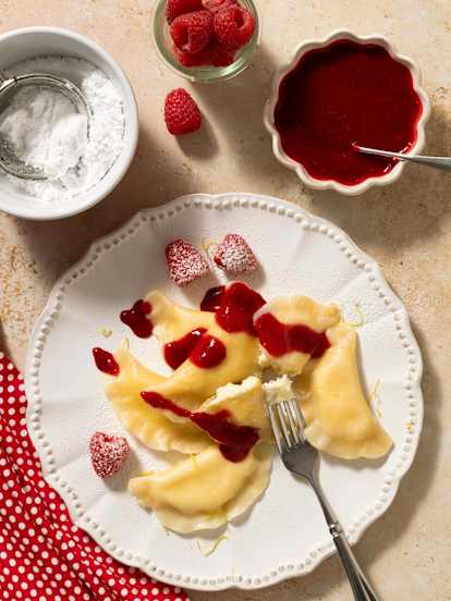 Cream cheese pierogi with raspberry sauce