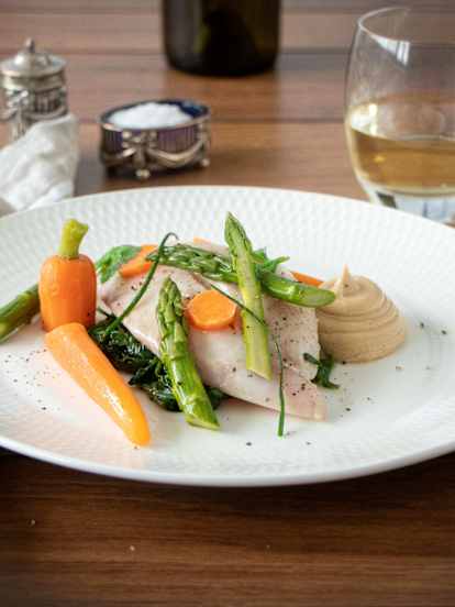 Sous-vide fish with lemon and herbs
