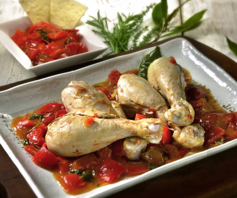 Poulet auf roten Peperoni