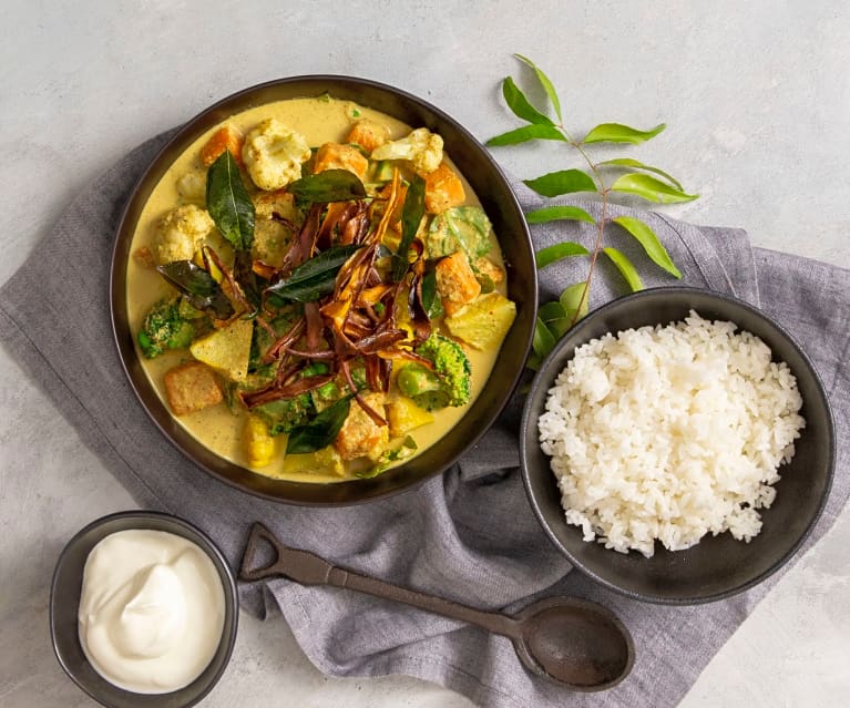 Sweet potato korma with crispy potato skins