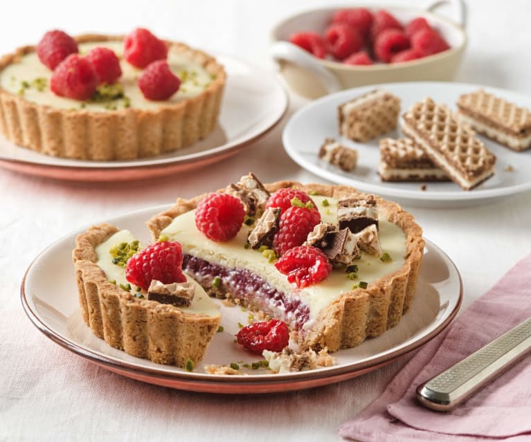 Mini Tarteletts mit weißer Schokolade und Himbeeren