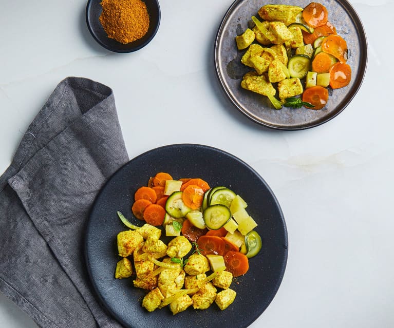 Bocconcini di pollo al curry con patate e verdure