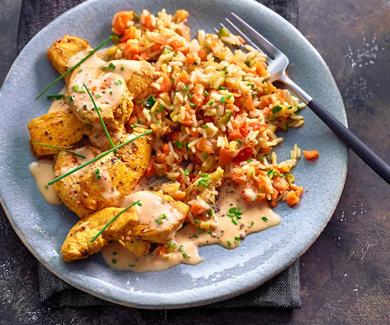 Hähnchen mit Zucchini-Möhren-Reis