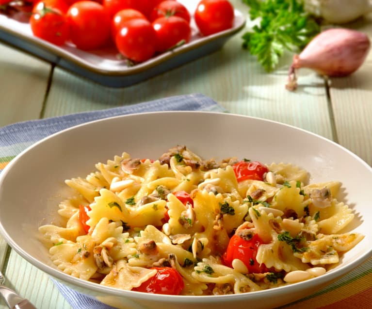 Farfalle risottate con vongole e pomodorini