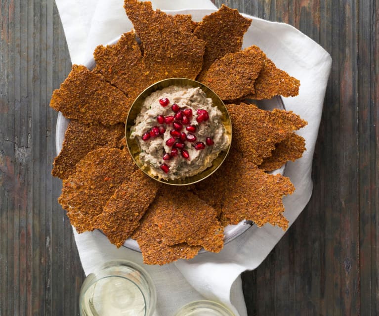 Linseed crackers with mutabbal beitinjan (eggplant dip)