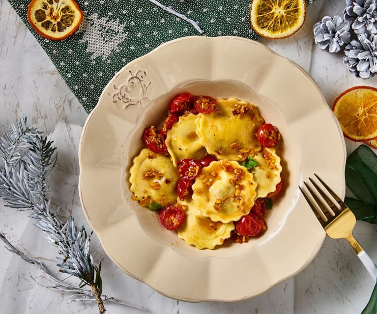 Ravioli di agrumi e menta con pomodorini confit