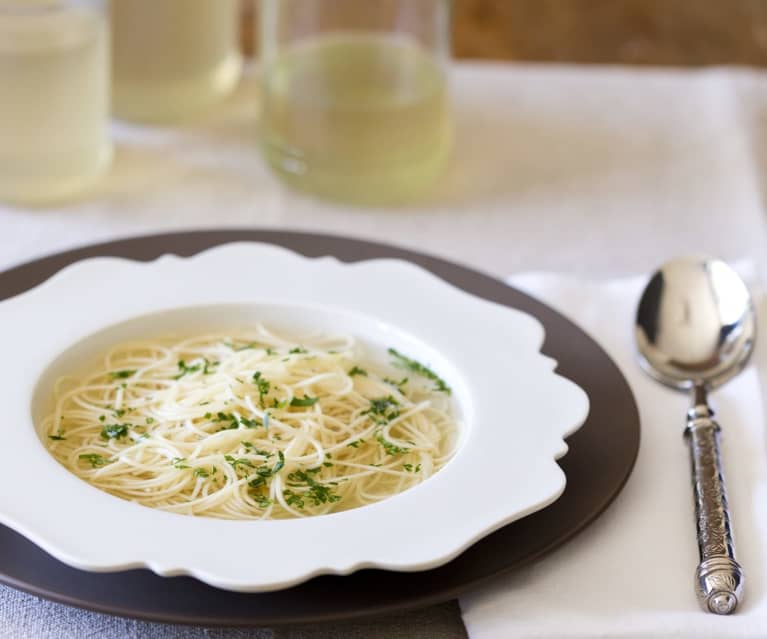 Traditional chicken broth with angel hair pasta