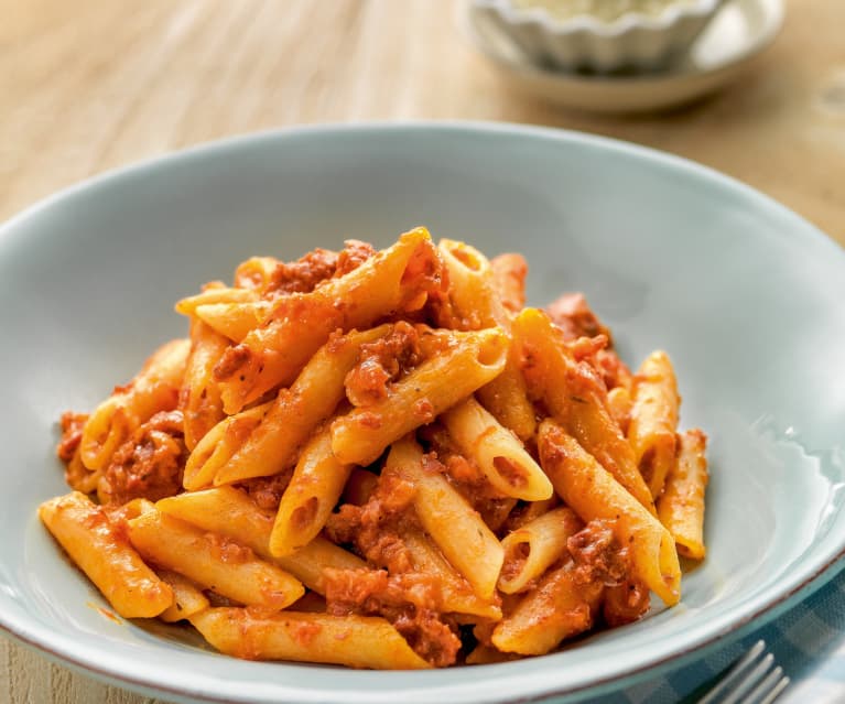 Pasta in tomato sauce with ham and chorizo