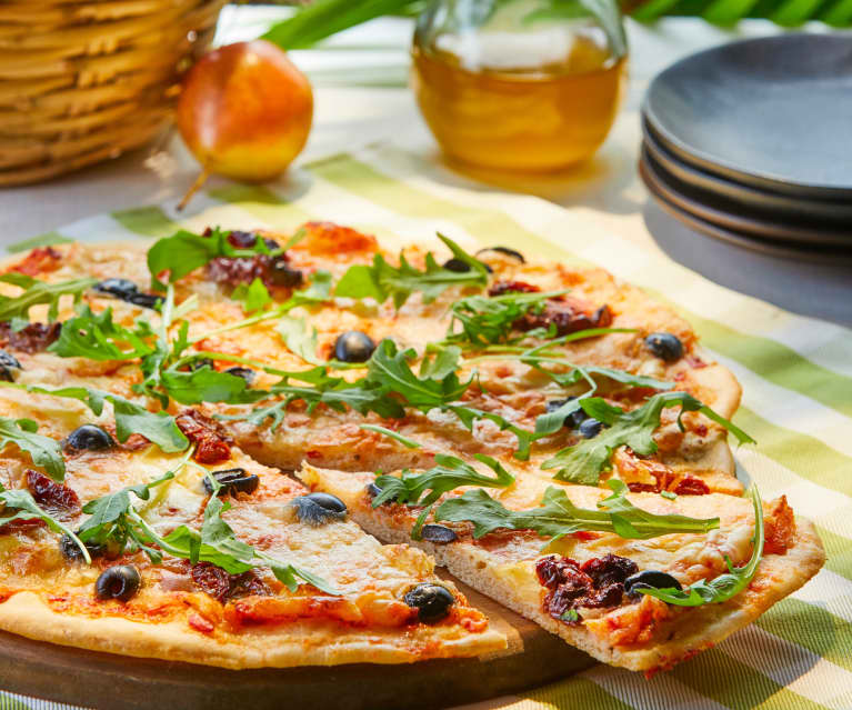 Pizza con arúgula y tomate seco