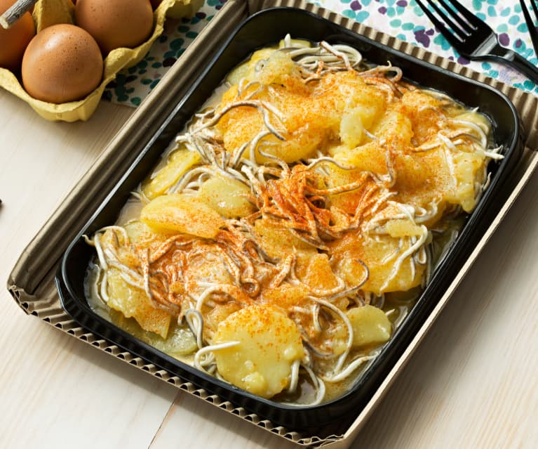 Huevos rotos con patatas y gulas