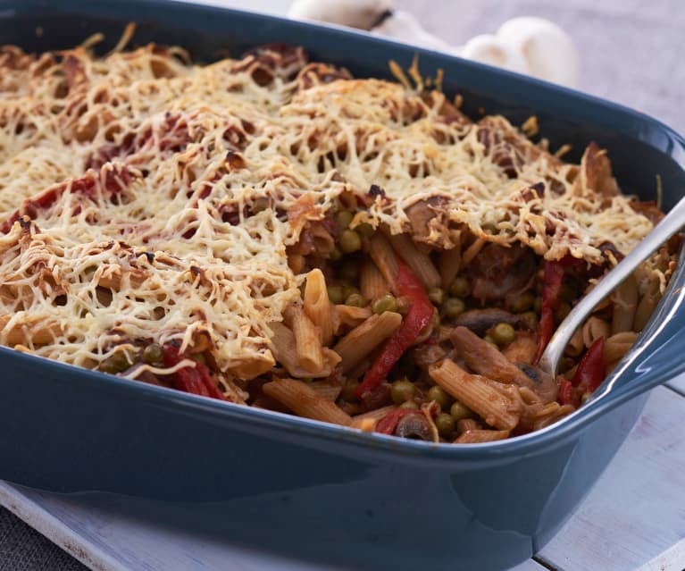 Pasta integral con champiñones, guisantes y pimientos del piquillo