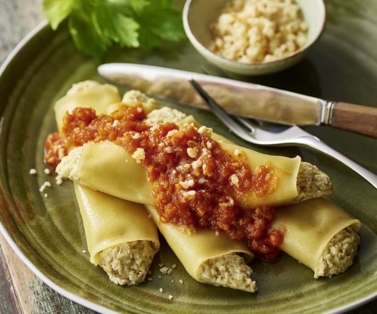 Cannelloni with artichoke filling and tomato sauce