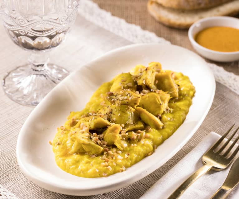 Coniglio alla curcuma con crema di patate e cipollotto