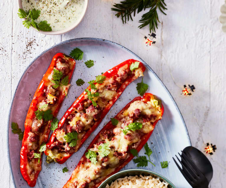 Überbackene Spitzpaprika mit Merguez und Reis