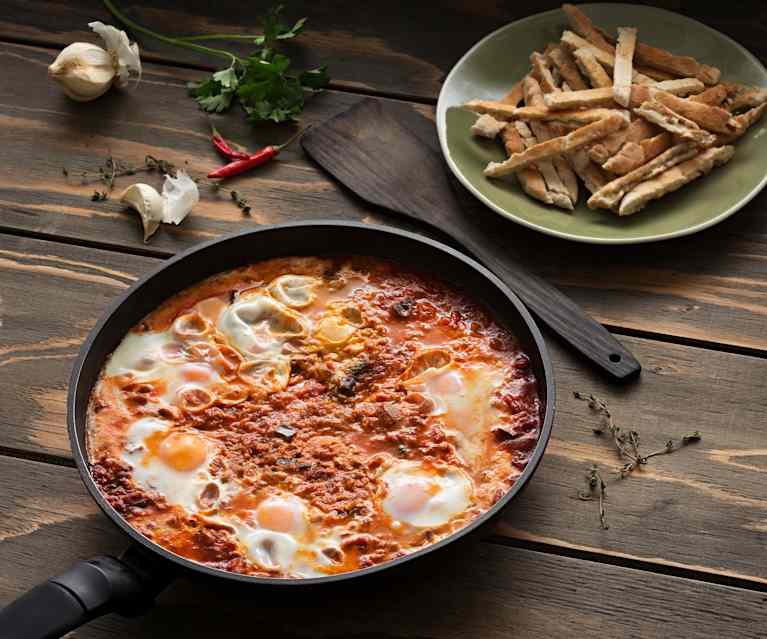 Guiso especiado de tomates con huevos (Shakshuka) - Israel Guiso especiado de tomates con huevos (Shakshuka) - Israel