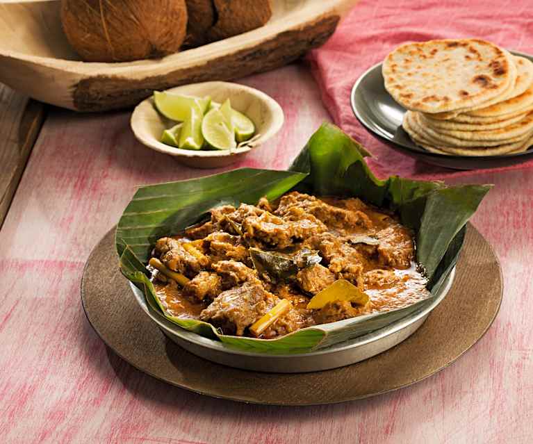 Guiso de ternera (Kuruma iraichchi) y pan roti de coco - Sri Lanka Guiso de ternera (Kuruma iraichchi) y pan roti de coco - Sri Lanka