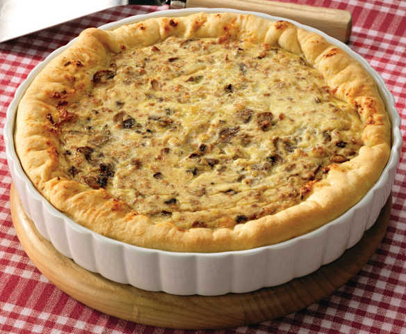 Quiche ai funghi e salsiccia aromatizzata all'olio tartufato Quiche ai funghi e salsiccia aromatizzata all'olio tartufato