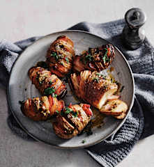 Hasselback potatoes with bacon and herb butter