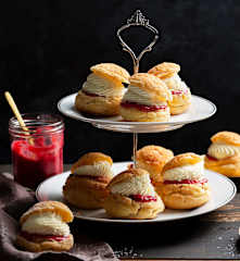 Craquelin choux puffs with raspberry and white chocolate filling
