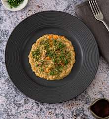 Risotto al caffè con zucca, funghi porcini e trito di finocchio selvatico