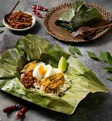 Sri Lankan banana leaf chicken rice parcels